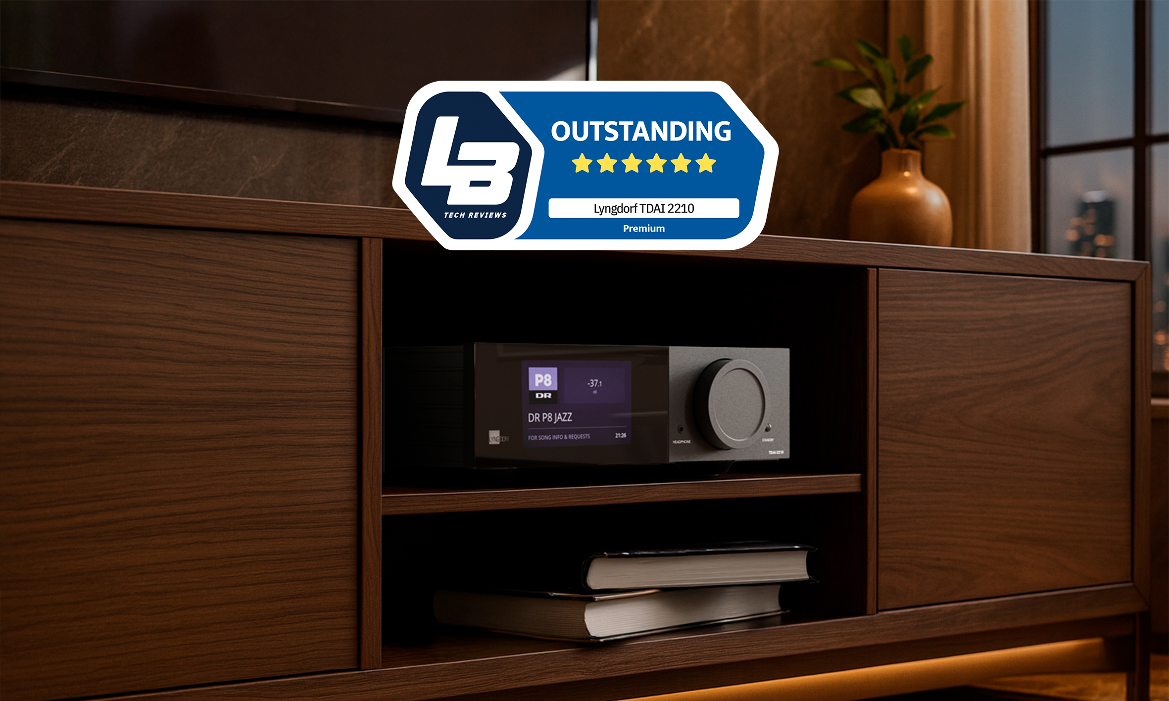 Lyngdorf TDAI-2210 amplifier in a dark wooden furniture