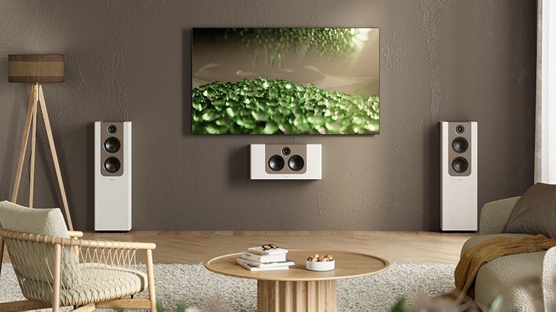 Lyngdorf FR-2 and FR-2 H speakers on a brown wall