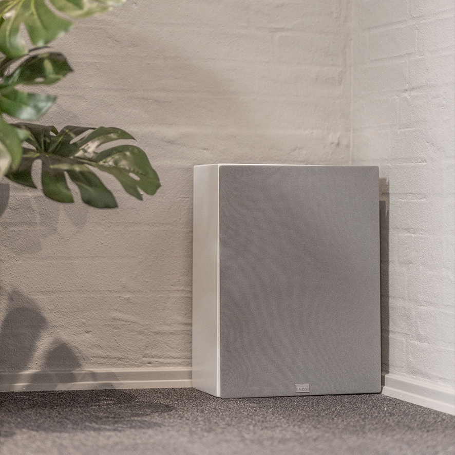 White Lyngdorf BW-2 woofer with grey fabric cover